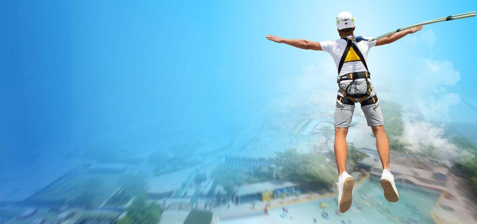A man experiencing the bungee jumping at Jurasik park